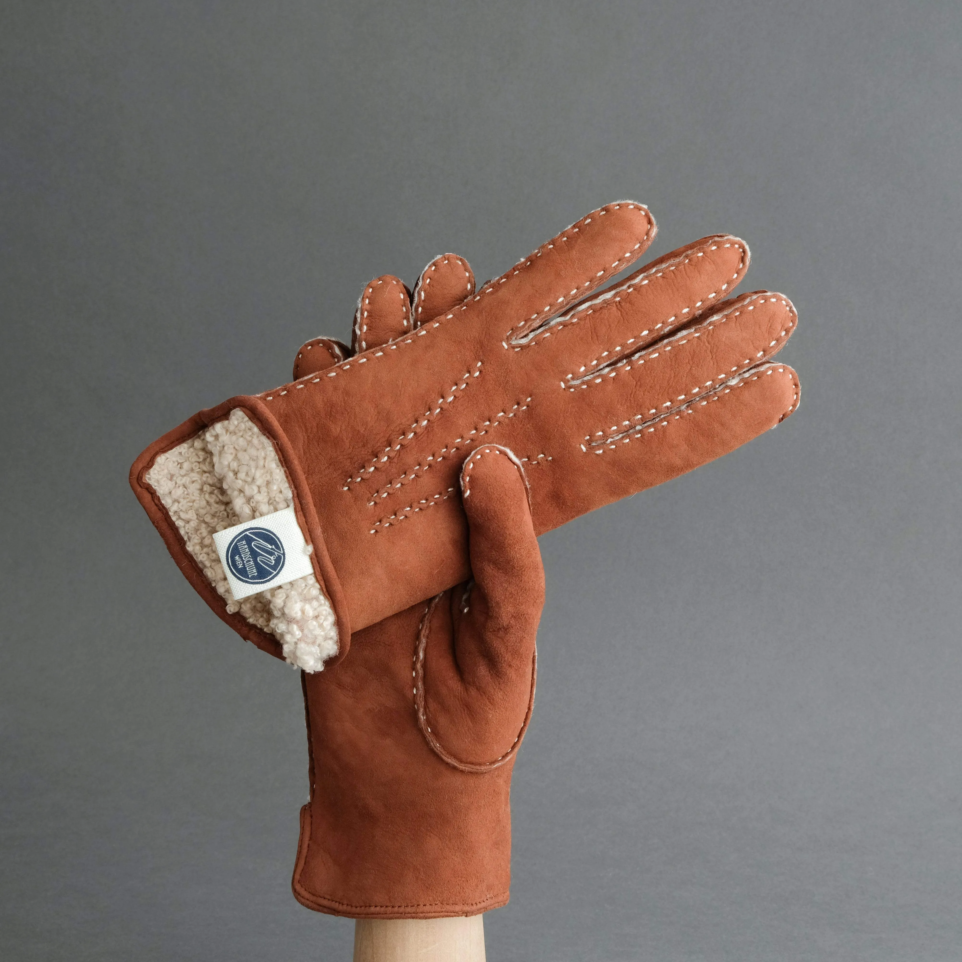 Ladies Hand Sewn Gloves From Rust Curly Lambskin